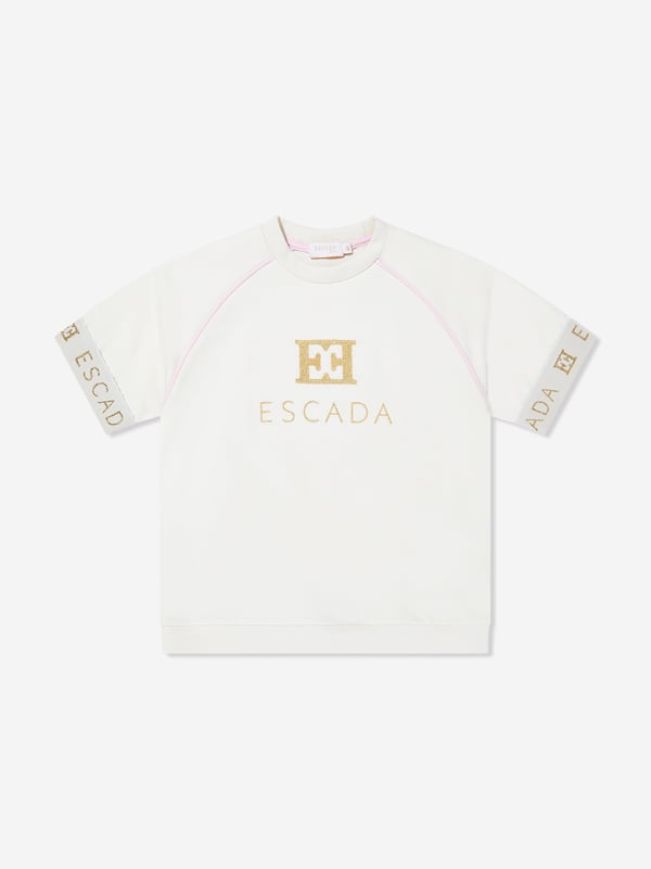 German heritage luxury label Escada embody modern innovation with timeless elegance. This girls snow white short sleeve t-shirt is woven in the finest high quality. It showcases Escada embroidery for a sleek and unforgettable look. Round Neck Short Sleeves Straight Hem 95 Cotton, 5 Elastane