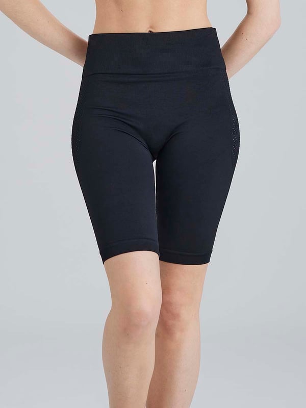 Pretty Polly Active-Wear Shorts are a seamless short which features a patterned mesh panels detail just below the waist for added breathability. Perfect for Yoga or Pilates or just relaxing at home. The fabric is soft and comfortable and is predominantly made from recycled yarn.
