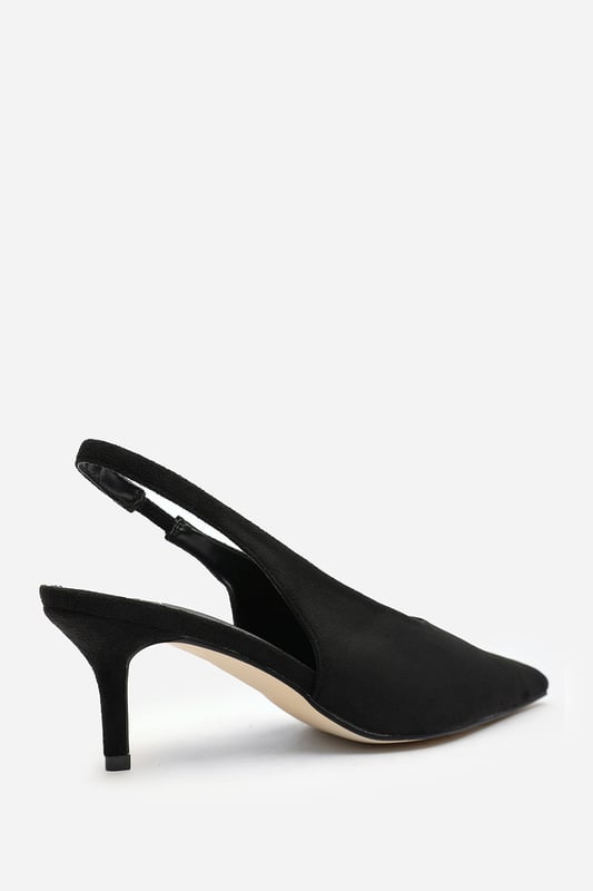 Wheres That From Womens 'Nora' Pointed Slingback Kitten Heels Step out in elegance with these Nora Pointed Slingback Kitten Heels, crafted in soft faux suede for a timeless finish. The pointed toe and low heel create a flattering, feminine silhouette perfect for day-to-night wear. Designed with a comfortable slingback strap, these heels pair effortlessly with dresses, trousers, or tailored sets. Key Features: • Material: Faux suede upper with smooth lining • Design: Pointed toe with slingback and kitten heel • Closure: Slip-on style with elasticated sling strap