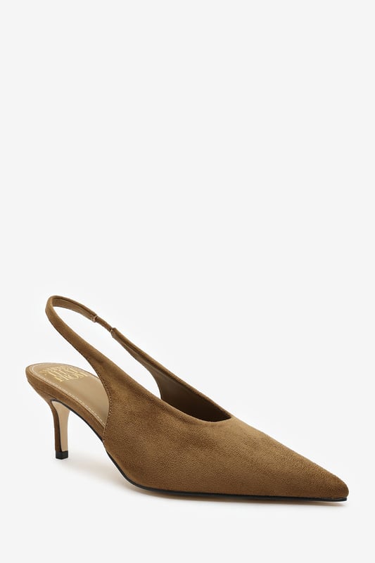 Step out in elegance with these Nora Pointed Slingback Kitten Heels, crafted in soft faux suede for a timeless finish. The pointed toe and low heel create a flattering, feminine silhouette perfect for day-to-night wear. Designed with a comfortable slingback strap, these heels pair effortlessly with dresses, trousers, or tailored sets. Key Features: • Material: Faux suede upper with smooth lining • Design: Pointed toe with slingback and kitten heel • Closure: Slip-on style with elasticated sling strap