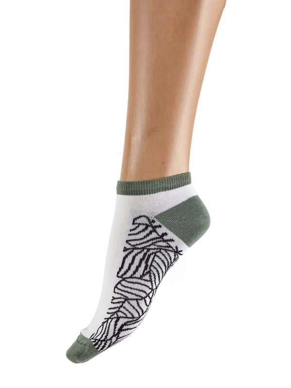 A new range of socks and liners, all knitted in bamboo - a beautifully soft and sustainable yarn. Creating organic shapes with our abstract leaf trainer socks. Made with bamboo cotton for a super soft handle, a must have for your sock drawer!