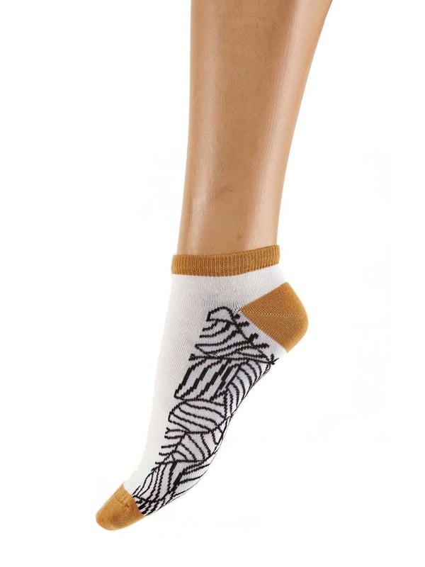 A new range of socks and liners, all knitted in bamboo - a beautifully soft and sustainable yarn. Creating organic shapes with our abstract leaf trainer socks. Made with bamboo cotton for a super soft handle, a must have for your sock drawer!