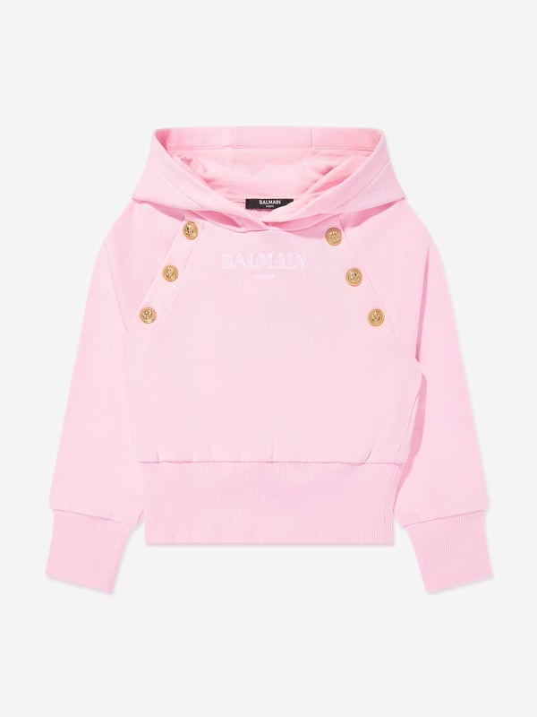 Balmain Girls Logo Hoodie in Pink Balmain embody distinctive Parisian sensibilities in their immaculate designs. This girls pink hoodie is reflective of the label's passion for raw innovation. Made in the finest cotton jersey with gold embellished buttons and Balmain Paris embroidered print. Ribbed HemCuffs 100 Cotton Trim 95 Cotton, 5 Elastane Embroidery 100 Polyester