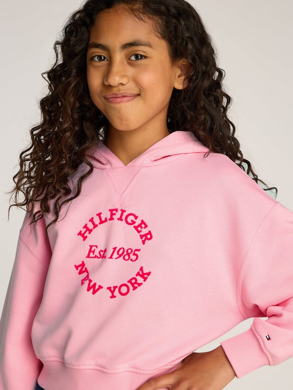 Introducing the exquisite Girls New York Hoodie in Pink by Tommy Hilfiger, a quintessential addition to any girl's wardrobe for SS2025. This designer hoodie embodies both flair and comfort, ensuring your little fashionista shines. Key features include Distinctive New York Chic Flaunting a vibrant pink hue inspired by the vivacious spirit of New York. Luxurious Comfort Crafted with premium fabrics, providing unparalleled softness wearability. Signature Hilfiger Style The iconic Tommy Hilfiger design merges tradition with trendy, setting your girl apart.Elevate her style this season with Tommy Hilfiger's Girls New York Hoodie in Pink.