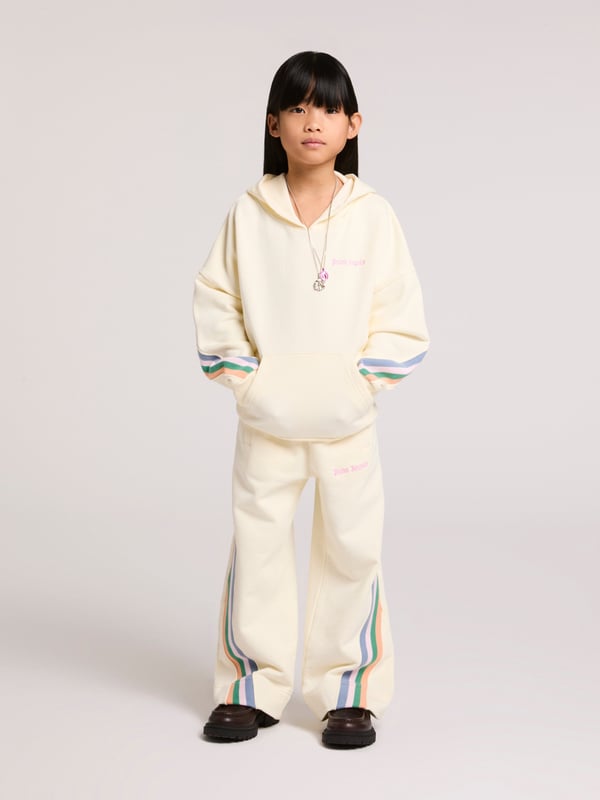 Introducing the exquisite Girls Colourful Track Hoodie in Ivory by Palm Angels, the pinnacle of style for SS2025. Crafted with precision for your young fashionista, this hoodie seamlessly melds comfort with couture. Key features include Chic Ivory Palette Elevates any ensemble with its understated elegance. Luxurious Comfort Crafted from superior materials to ensure all-day ease. Signature Palm Angels Flair Distinctive design accents that stand out effortlessly.Revitalize her wardrobe with this iconic piece, a testament to refined fashion. Shop now!