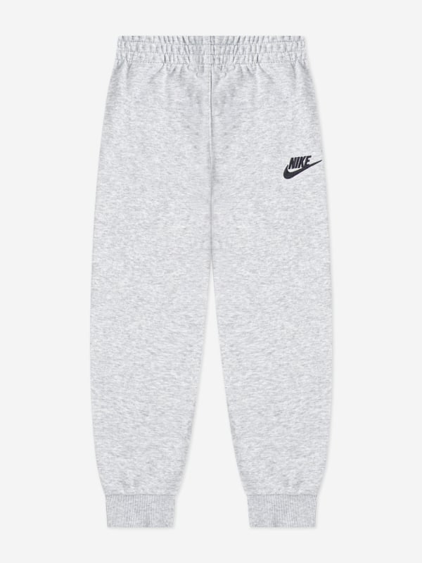 Introducing the Boys NSW Tracksuit in Black by Nike the pinnacle of luxe sportswear for SS2025. Elegantly tailored, this tracksuit assures both style comfort. Here's why it's essential Sophisticated Design Sleek, stylish in classic black. Perfect for any occasion. Premium Comfort Crafted from superior fabrics offering unmatched comfort durability. Versatile Style Ideal for sports, leisure, or casual outings. Elevate his wardrobe with the timeless Nike NSW Tracksuit. Order now for standout SS2025 style!
