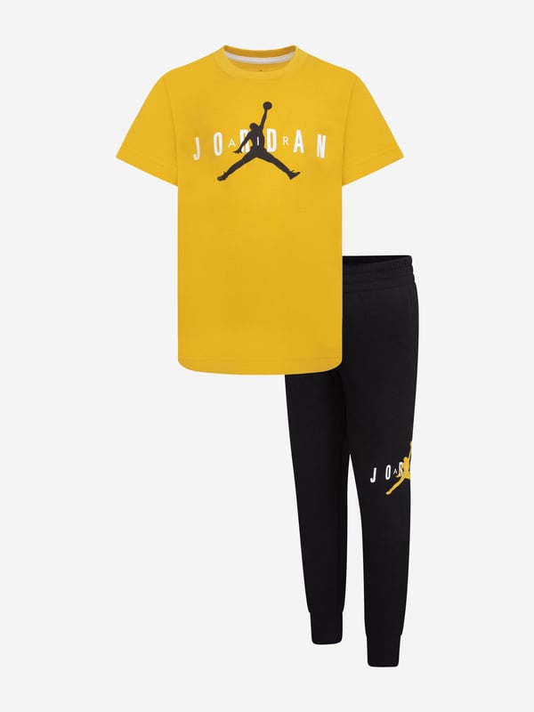 Jordan Kids Jumpman Sustainable Trouser Set in Yellow Introducing the Kids Jumpman Sustainable Trouser Set in Yellow, the latest venture from Jordan into sustainable fashion. This attire offers style and practicality, making it an ideal fit for SS2024. Its key features include Sustainable Design Crafted from eco-friendly materials, the trouser set ascertains that your child's style doesn't harm the planet. Statement Hue The vibrant yellow boosts the sets appeal, letting your kid make a trendy fashion statement. Versatility Tailored to fit both boy and girl wardrobes, this trouser set ensures outstanding comfort and unrivalled style. Elite Brand Coming from Jordan, a renowned name in fashion, this set leads the way in high-end children's wear.This Kids Jumpman Sustainable Trouser Set in Yellow is waiting to bring a burst of sunshine and sustainability to your child's attire. Invite style that cares order now!