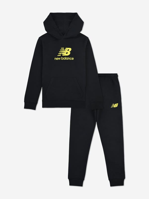 Introducing the Boys Brush Back Stacked Logo Tracksuit in Black by New Balance, the quintessential addition for AW2024. Designed specifically for style and practicality, this ensemble is set to elevate your young one's wardrobe Sleek Black Hue Deep, versatile black for a sharp, classic look. Iconic Stacked Logo Bold New Balance branding for standout style. Premium Comfort Crafted from soft, durable fabric for all-day wear. Contemporary Design Modern fit that speaks to current trends.Revamp with sophistication! Order now and let your boy make his mark with confidence and style!