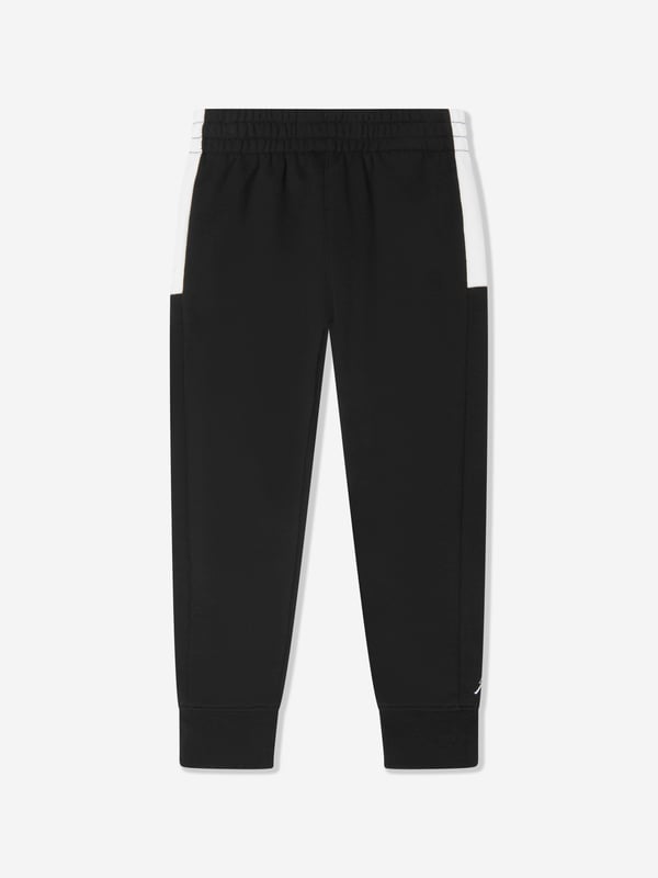 Introducing the Boys Jumpman Team Blocked Tracksuit in Black by Jordan, a premium addition to your boys AW2024 wardrobe. Meticulously crafted for both style and performance, this tracksuit is essential for young trendsetters. Key features include Sleek Design Sharp, clean lines with a bold black colourway for a classic, sporty look. Enhanced Mobility Lightweight fabric that allows free movement, perfect for active boys. Durable Material Constructed with high-quality materials to withstand frequent wear and washing. Iconic Branding Featuring the distinctive Jumpman logo for that touch of exclusivity.Embrace style and comfort with this must-have tracksuit!