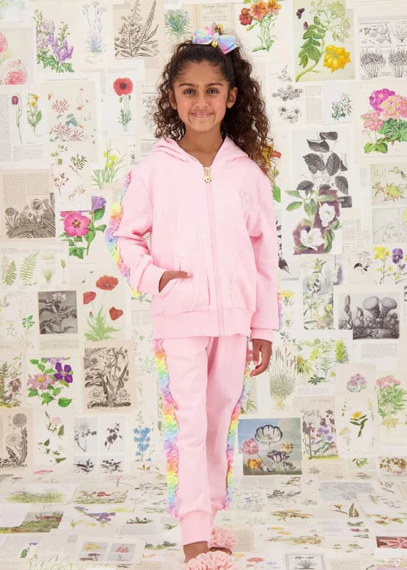 Indulge your little one with the Girls Estella Rainbow Trim Tracksuit in Pink by Angels Face, an essential chic addition for SS2025. Vibrant Rainbow Accents Bright, captivating trim adds a splash of colour. Luxuriously Soft Crafted for comfort with premium fabrics. Effortlessly Stylish Designed for the fashion-forward girl.Transform her wardrobe with this exquisite piece from Angels Face. Perfect for stand-out style and comfort during play or leisure. Shop now!