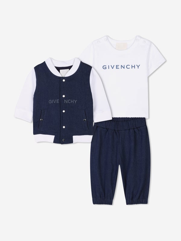 Givenchy's inherent sensibility and grammar of elegance are projected in this baby unisex denim blue tracksuit set. It contains a cardigan, trousers, and t-shirt. The cardigan is a bimaterial design via fleece denim and dynamic Givenchy patterning. The matching trousers are also engineered in the same material and design whilst the cotton jersey t-shirt showcases a metallic Givenchy print on the front. All of the pieces are beautifully presented in a gift box. Cardigan Front Snap Closure Trousers Elasticated Waist and Bottom Leg T-Shirt Shoulder Snap Closure 88 Cotton, 11 Polyester, 1 Elastane