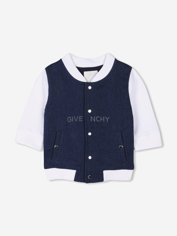 Givenchy's inherent sensibility and grammar of elegance are projected in this baby unisex denim blue tracksuit set. It contains a cardigan, trousers, and t-shirt. The cardigan is a bimaterial design via fleece denim and dynamic Givenchy patterning. The matching trousers are also engineered in the same material and design whilst the cotton jersey t-shirt showcases a metallic Givenchy print on the front. All of the pieces are beautifully presented in a gift box. Cardigan Front Snap Closure Trousers Elasticated Waist and Bottom Leg T-Shirt Shoulder Snap Closure 88 Cotton, 11 Polyester, 1 Elastane