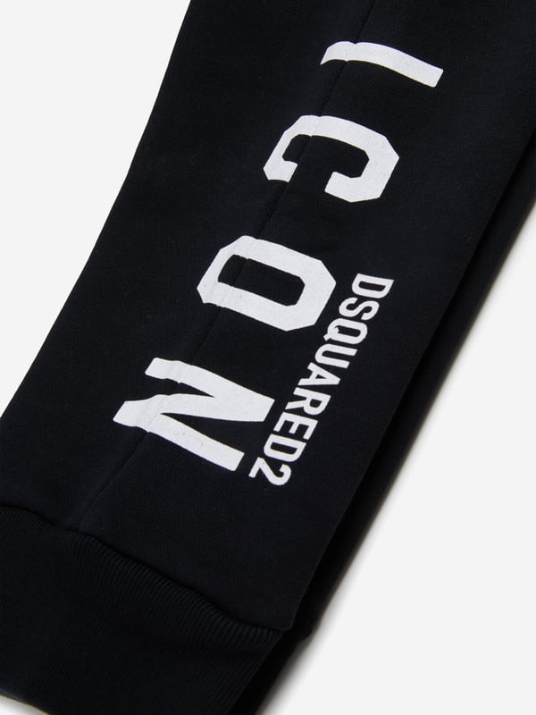 Introducing the refined Kids Icon Joggers in Black by dsquared2 kids, a quintessential piece for any boy or girl's wardrobe for SS2025. Meticulously crafted, these joggers marry both style and comfort flawlessly. Discover their unique attributes Luxurious Comfort Crafted with premium fabrics ensuring all-day ease and a snug feel. Chic Design Timeless black hue accented with the distinct dsquared2 logo for a touch of elegance. Versatile Wear Perfect for both casual outings and stylish gatherings.Elevate your child's ensemble with these exquisite joggers. Shop now!