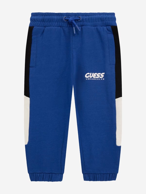 Introducing the exquisite Boys Active Track Pants in Blue from Guess, an essential addition to your young gentleman's wardrobe for SS2025. Meticulously crafted, these pants epitomise both luxury and functionality. Key features include Streamlined Fit Tailored for comfort and style, perfect for active days. Vibrant Blue Hue A dazzling shade that stands out with sophistication. Premium Fabric Ensures durability and breathability. Adjustable Waistband Provides a perfect fit as he grows.Elevate his style this season with these chic track pants!