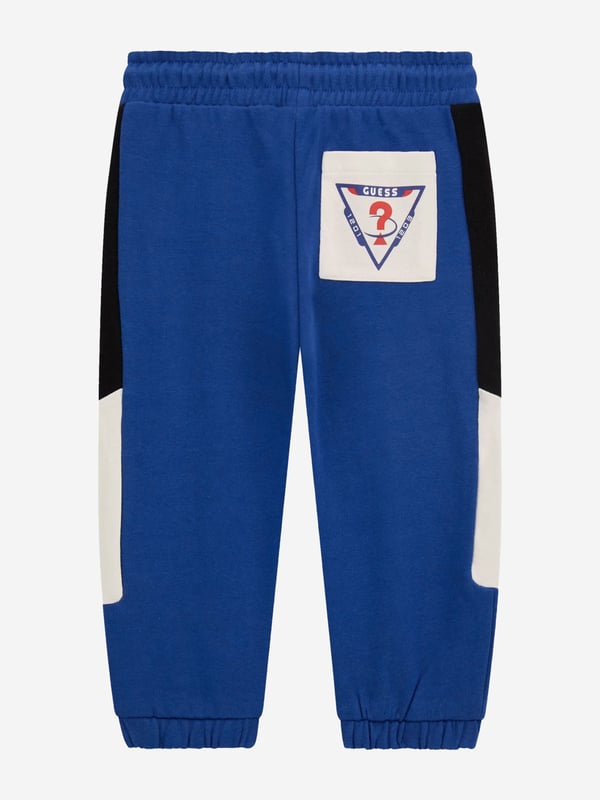 Introducing the exquisite Boys Active Track Pants in Blue from Guess, an essential addition to your young gentleman's wardrobe for SS2025. Meticulously crafted, these pants epitomise both luxury and functionality. Key features include Streamlined Fit Tailored for comfort and style, perfect for active days. Vibrant Blue Hue A dazzling shade that stands out with sophistication. Premium Fabric Ensures durability and breathability. Adjustable Waistband Provides a perfect fit as he grows.Elevate his style this season with these chic track pants!