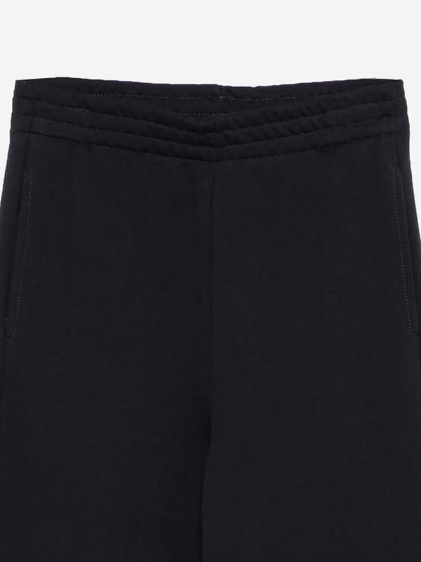Marni's vintage archives are incorporated with care and spellbinding craftsmanship. These unisex joggers are woven in fleece with a Marni Outline logo in contrasting colour on the front. Drawstring Waist Elastic At Ankle Front Welt Pockets 100 Cotton Delicate Wash Max 30C Do Not Bleach Cool Iron Max 110C Do Not Dry Clean Do Not Tumble Dry Dry Flat in Shade