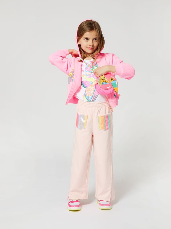 Billieblush incorporate high quality detailing and an advanced outlook on contemporary designs. These girls pale pink joggers are woven in brushed cotton with sequin pockets. Elasticated Waist Side Slits At Bottom 100 Cotton