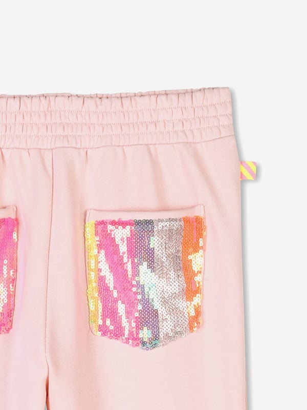 Billieblush incorporate high quality detailing and an advanced outlook on contemporary designs. These girls pale pink joggers are woven in brushed cotton with sequin pockets. Elasticated Waist Side Slits At Bottom 100 Cotton