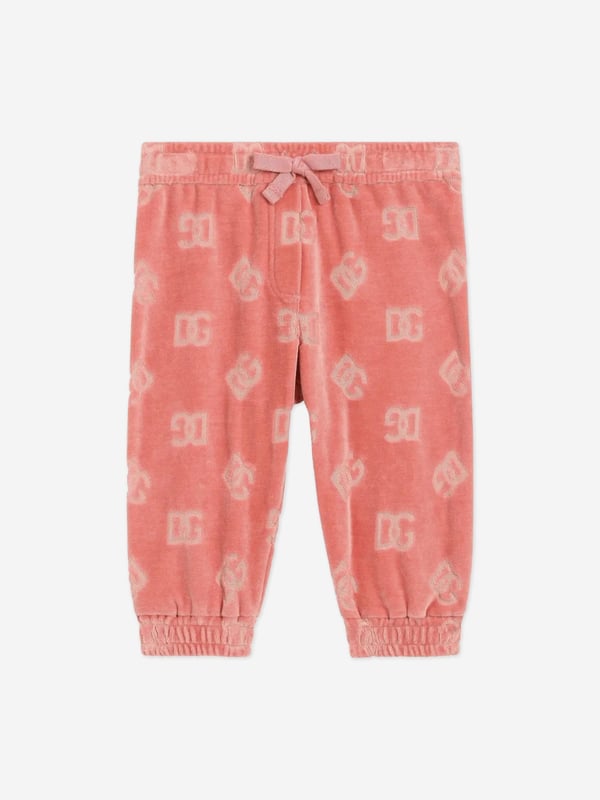 Introducing the exquisite Baby Girls Jacquard Logo Joggers in Pink by Dolce Gabbana, the epitome of Italian craftsmanship perfect for SS2025. Delight in these pristine features Luxuriously Crafted in Italy Ensures supreme quality and enduring charm. Signature Jacquard Logo Emboldens each piece with iconic Dolce Gabbana prestige. Optimal Comfort Tailored from soft fabrics to pamper your little one in luxury.Elevate her wardrobe with this stellar blend of style sophistication! Order now for timeless elegance.