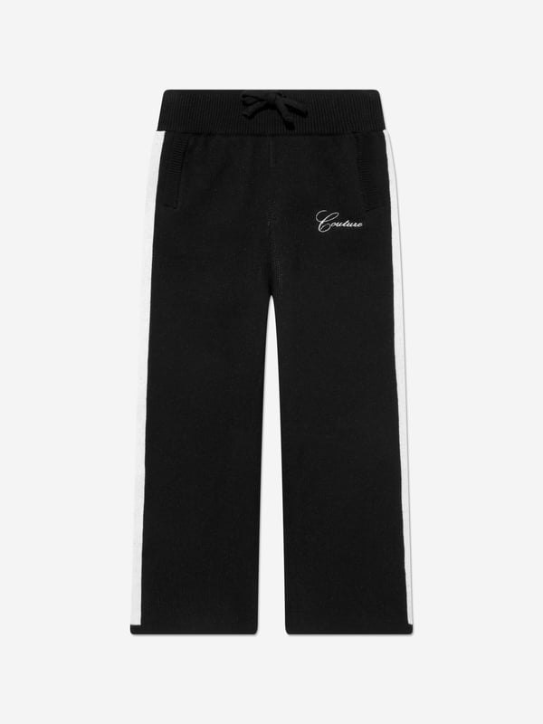 The Couture Club embody innovation and sophistication in their streetwear portraits. These kids side stripe knitted joggers in black are made from beautiful high quality. Functional Welt Pocket to Back Straight Leg Knitted Joggers Wide Contrast Panelling Ribbed Waistband With Drawcords Embroidered Contrast Logo to Front Left Leg Ribbed Welt Side Pockets 100 Cotton