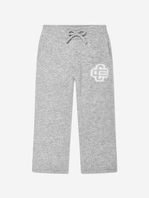 Manchester based label The Couture Club embody innovation and a revitalised perspective on urban streetwear. These kids fluffy knit emblem joggers in grey are perfect for casual everyday. Elastic Drawcord Pockets Iconic Motif