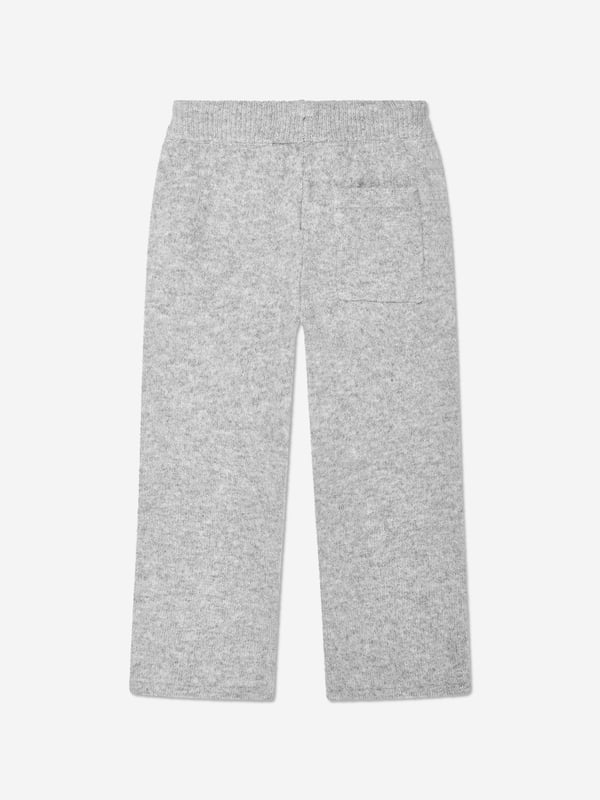 Manchester based label The Couture Club embody innovation and a revitalised perspective on urban streetwear. These kids fluffy knit emblem joggers in grey are perfect for casual everyday. Elastic Drawcord Pockets Iconic Motif