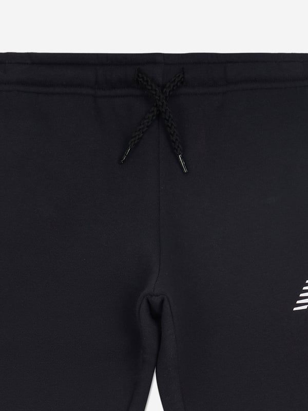 Introducing the Boys Brush Back Stacked Logo Joggers in Black by New Balance, a luxurious addition to your boy's AW2024 wardrobe. Crafted with precision, these joggers blend iconic style with unparalleled comfort. Key features include Signature New Balance Logo Bold stacked design for a stylish statement. Premium Fabric Soft, high-quality material ensures comfort durability. Versatile colour Classic black matches effortlessly with any outfit.Elevate your boy's fashion with these chic New Balance joggers! Perfect for stylish adventures.