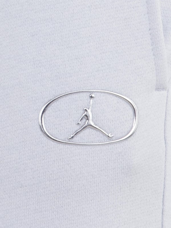 Introducing the Girls Logo Joggers in Grey from Jordan, an essential addition to your little girl's wardrobe for AW2024, blending premier comfort with iconic style. Key highlights include Luxe Comfort Crafted with soft, high-grade fabrics for all-day ease. Signature Design Featuring Jordan's classic logo for a chic, sporty look. Versatile Grey Shade Effortlessly complements various outfits.Elevate her style this season with these exquisite joggers. Order now and let her shine in unparalleled comfort and elegance!
