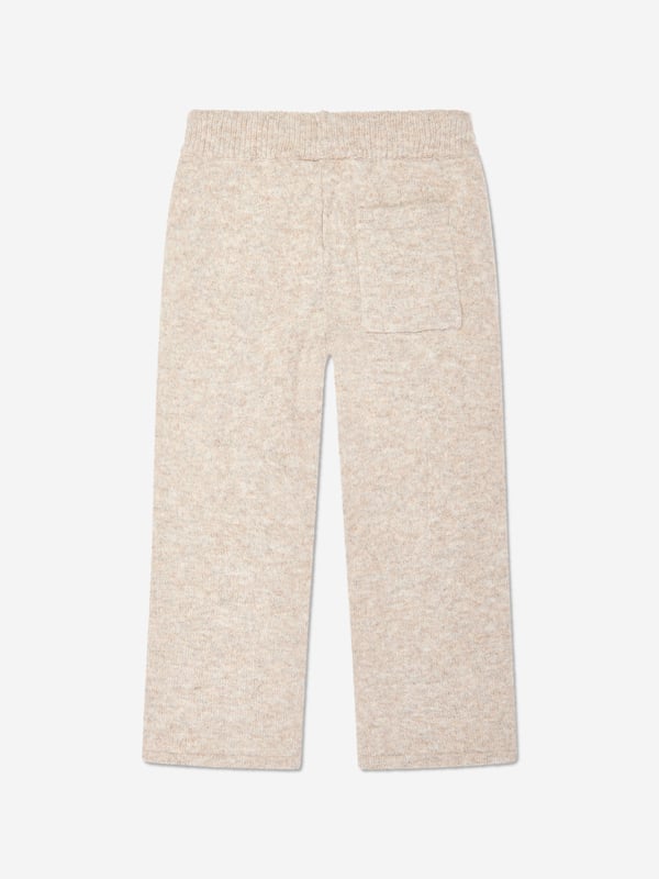 Manchester based label The Couture Club embody innovation and a revitalised perspective on urban streetwear. These unisex beige joggers harmonise urban streetwear with modern technology. Made in refined high quality. They showcase an elasticated waistband, back pocket and the iconic emblem to the side. 75 Polyester, 22 Acrylic, 3 Elastane