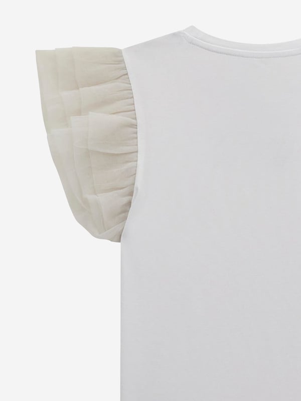 Girls Tulle Sleeve T-Shirt in White Introducing the exquisite Girls Tulle Sleeve T-Shirt in White by Guess, a quintessential addition to your little one's wardrobe for SS2025. Blending elegance with modern flair, this t-shirt is a must-have. Key features include Elegant Tulle Sleeves Delicate and airy, perfect for stylish comfort. Premium Quality Crafted from superior materials ensuring durability and softness. Versatile Charm Ideal for both special occasions and casual outings. Elevate your girl's fashion game with this chic, unmissable piece. Order now!