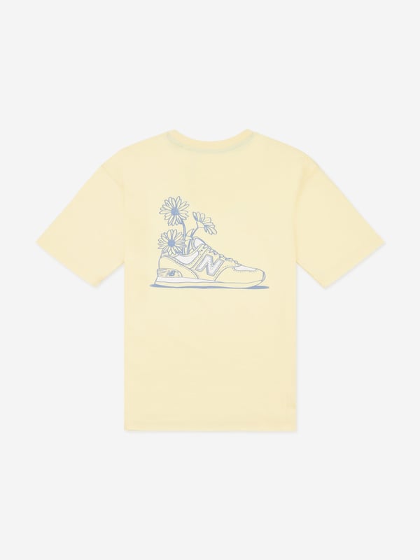 Introducing the Girls Floral Sneaker Back Graphics T-Shirt in Yellow by New Balance Apparel a chic addition for SS2025. Each detail is crafted for style and comfort, ensuring your girl shines with every wear. Eye-catching Design Features vibrant sneaker and floral graphics for a modern twist. Premium Comfort Constructed with soft fabrics for all-day ease. Versatile Yellow Hue Bright and sunny, perfect for pairing with any outfit.Embark on a fashion-forward journey with this exquisite piece. Add flair to your girl's wardrobe today!