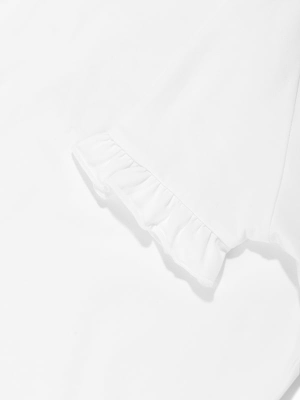 Girls Embroidered Logo T-Shirt in White German heritage luxury label Escada combine modern innovation with timeless elegance. This girls bright white t-shirt is a captivating construction. It features the iconic motif in a glitter effect with press-stud fastenings. Round Collar Short Sleeves Straight Hem 95 Cotton, 5 Elastane