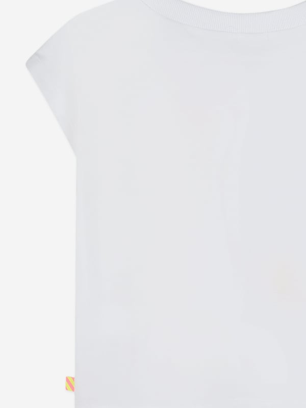 Introducing the Girls Wake Me Up! T-Shirt in White by billieblush a quintessential addition to any young lady's SS2025 wardrobe. Revel in the charm and elegance of this designer piece Chic White Hue Impeccably crafted in a radiant white, reflecting a fresh and crisp aesthetic. Playful Graphic Features a delightful, eye-catching print perfect for adding a sparkle of fun. Premium Comfort Finely made with superior fabrics ensuring all-day ease and comfort.Revitalize her collection today with this stylish and comfortable t-shirt. A timeless ensemble awaits!