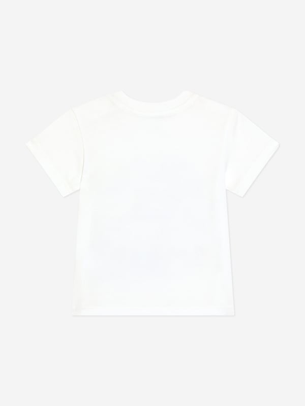 Dolce Gabbana project exquisite concepts into their beautifully crafted aesthetics. This baby boys short sleeve t-shirt is a refined construction to adore. Part of the Boys Riviera Collection which merges sophistication and verve. It is engineered in cotton jersey with a statement DolceGabbana logo print. There are concealed press-stud fastenings on the shoulder for easy dressing. Made in Italy Regular Fit Ribbed Round Neck 100 Cotton
