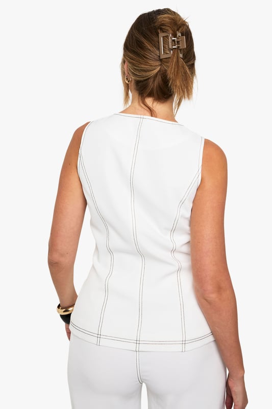 Sleek bandeau waistcoat featuring eye-catching gold buttons for a luxe finish
        Distinctive contrast stitching detail that adds visual interest and dimension
        Figure-flattering regular fit with structured seaming for a polished silhouette
        Versatile sleeveless design perfect for layering or wearing as a standalone piece
        Tailored shape with a subtle peplum effect at the waist for added definition
    
    Make a statement with this contemporary waistcoat that combines classic tailoring with modern details. The striking contrast stitching and gleaming gold buttons transform this piece from simple to standout, whilst the structured fit creates a flattering shape that works for various body types. Style with matching wide-leg trousers for a coordinated ensemble that's perfect for brunches or casual gatherings. For everyday wear, pair with your favourite denim and trainers for an effortlessly chic look. When the evening calls for something more refined, layer over a crisp shirt with tailored trousers and heels. This versatile waistcoat transitions seamlessly from day to night, making it an essential addition to your wardrobe that offers countless styling possibilities throughout the seasons.