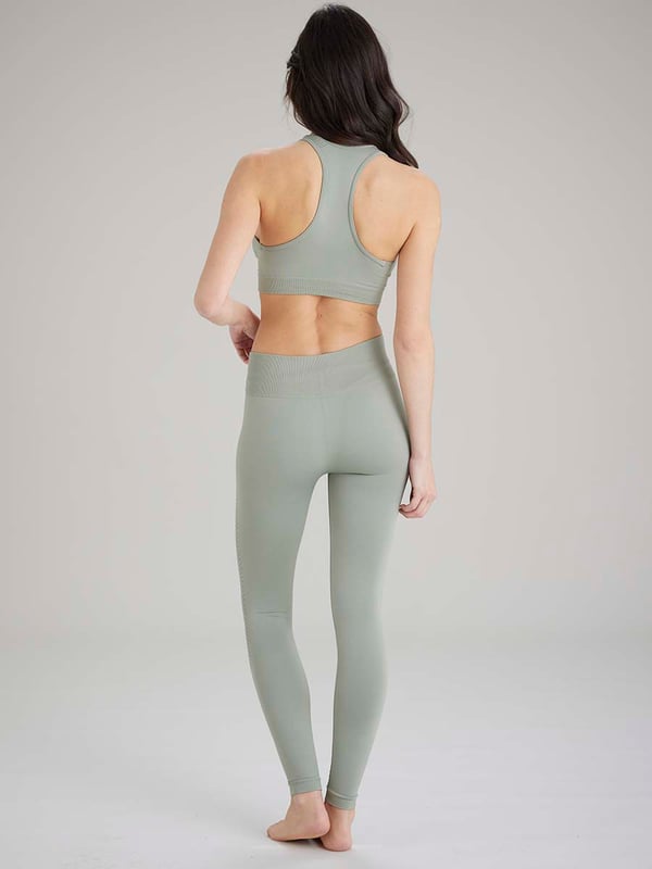 Pretty Polly Active-Wear Crop Top is a seamless top which features a patterned mesh panels detail around the neck line for breathability and a racer back design. Perfect for Yoga or Pilates or just relaxing at home. The fabric is soft and comfortable and is predominantly made from recycled yarn.