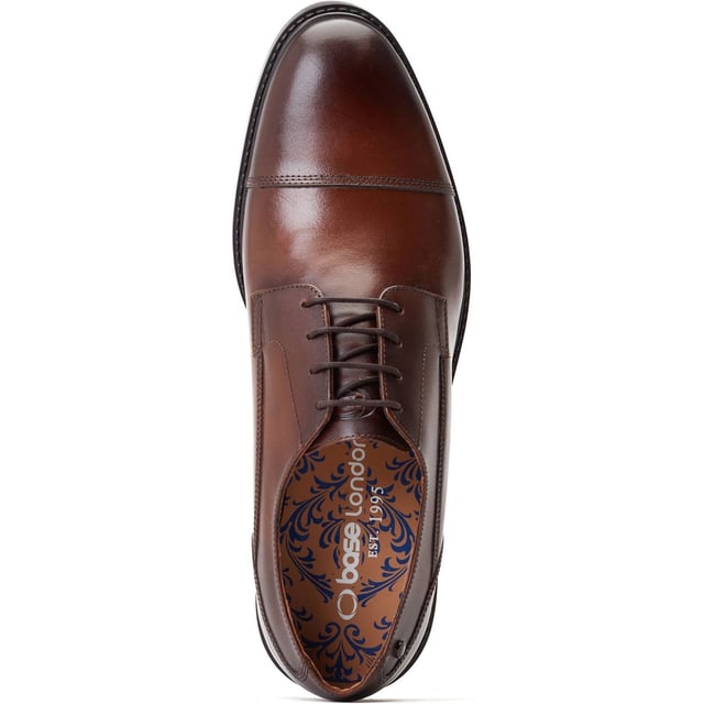 Base London Magnus Leather Men's Burnt Brown Oxford Shoes Straight to the point with absolutely no faff, the Magnus Toe-Cap Derbies from Base London are for the man that means business. Quality leather uppers, cushioned Ortholite insole and a secure rubber tread - nuff said!