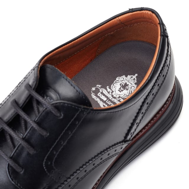Base London Flight Leather Men's Black Brogues Shoes This super lightweight brogue from Base London incorporates the latest sole technologies into classic British design to make each step feel light as a feather. Glide to work in style or cut some shapes on the dance floor, Flight will take you there.