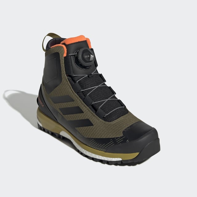 Warm, dry feet make all the difference when the weather is cold and wet. Made for winter hikes, snowshoe adventures and long, cold days outdoors, these adidas Terrex winter boots are waterproof and fully insulated. COLD.RDY with PrimaLoft® wraps your foot in heat-sealing warmth, while RAIN.RDY seals out slush, snow and rain to keep feet dry all day long. A BOA® Fit System lets you dial in a precise fit for confident footing. A BOOST midsole cushions and brings energy to every step, on and off the snow and in all temperatures. The Stealth winter grip rubber provides high-friction traction for confident footing on slick, icy ground.  - Micro-adjustable dial-based BOA® Fit System - Waterproof textile upper with moulded toe cap and external heel clip - PrimaLoft® insulation - Insulating COLD.RDY - BOOST midsole - Stealth winter grip rubber outsole  Shipped by adidas