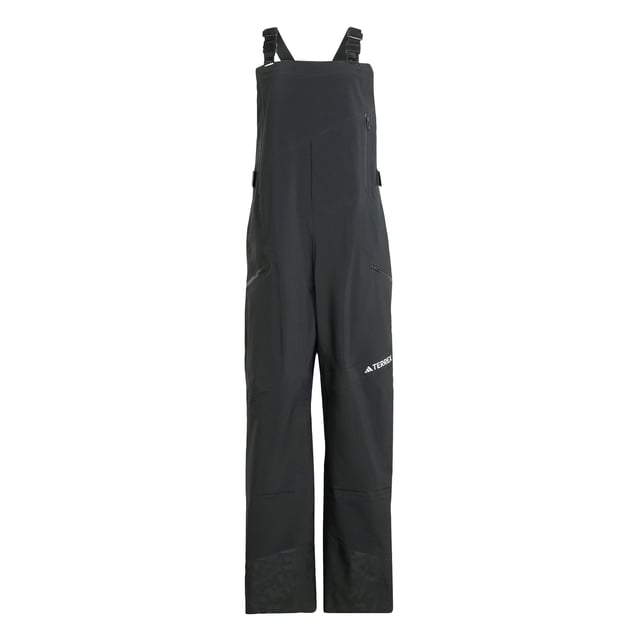 Ride the resort and explore the backcountry in bib pants that give you the freedom to roam. These adidas Terrex snow bibs feature three-layer GORE-TEX construction and the soft, easy-moving feel of C-Knit backer. Made for layering to match the conditions, they offer breathable, storm-sealing coverage while maintaining a lightweight feel and a full range of motion. Reinforced cuffs hold up to ski edges, while built-in boot gaiters seal out snow. Stretch flooce in the back panel maintains an unrestricted range of motion and adds warmth where needed. Two-way leg zips offer venting on the uptrack and make for easy on-and-off, while a drop seat makes for easy bathroom breaks. A mix of pockets, including two thigh pockets and an internal phone pocket, keep must-have stuff close and secure.This product is made with at least 70% recycled materials. By reusing materials that have already been created, adidas help to reduce waste and our reliance on finite resources and reduce the footprint of