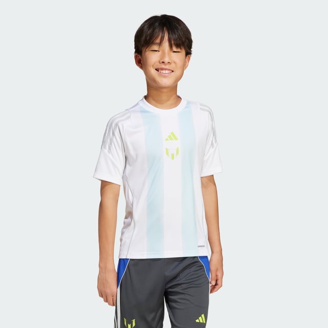 Lionel Messi makes the extraordinary look easy. Created for juniors who want to raise their own game, this adidas training jersey employs moisture-managing AEROREADY to keep you comfortable through every drill. A Messi logo on the chest shows your dedication to following in the footsteps of football's greatest.  - Regular fit - Crewneck - 100% polyester (recycled) - AEROREADY - Messi logo  Shipped by adidas