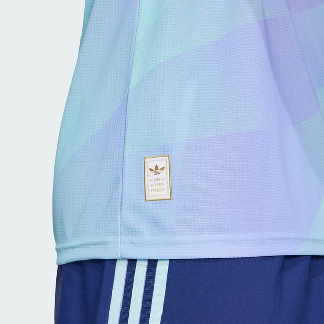 A fresh take on football heritage. Standing out in lilac and aqua, this Arsenal third authentic jersey pairs a bold cannon badge with an iconic adidas Trefoil. The result? A vibrant look that will add colour to dressing rooms, away ends and post-game celebrations. HEAT.RDY and lightweight details make for lively performances on the pitch.This product is made with 100% recycled materials. By reusing materials that have already been created, adidas help to reduce waste and our reliance on finite resources and reduce the footprint of the products adidas make.  - Slim fit - Flat-knit crewneck - 100% polyester (recycled) - Soft fabric - HEAT.RDY - Flat-knit cuffs - Arsenal heat-applied crest  Shipped by adidas