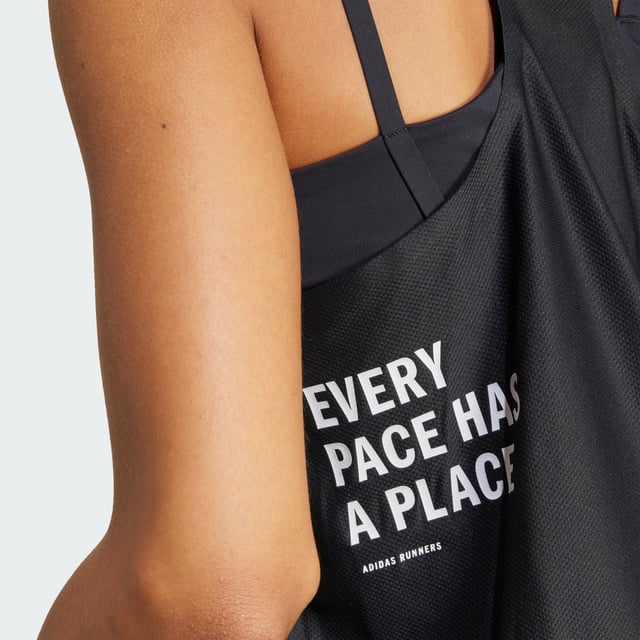 Run with the adidas community every time you pull on this running singlet. It's celebrates that clarity and connection that running fosters, and it keeps you comfortable as you chase your goals. CLIMACOOL wicks and disperses sweat for cool, dry and distraction-free performance, so you feel good on easy miles or race day.CLIMACOOL helps you manage sweat with materials that wick and manage sweat quickly. Its fast-dry fibres give you a fresh-skin feel.This product is made with at least 70% recycled materials. By reusing materials that have already been created, adidas help to reduce waste and our reliance on finite resources and reduce the footprint of the products adidas make.  - Regular fit - Round neckline - 86% polyester (recycled), 14% elastane - CLIMACOOL - Racer back - Reflective logos  Shipped by adidas
