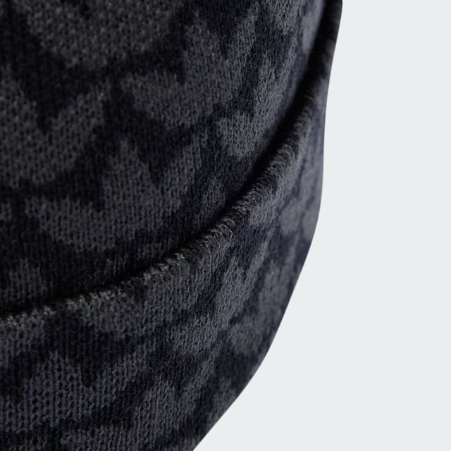 Monogram Beanie Stay stylish while keeping warm. This adidas Monogram Beanie features an allover Trefoil print and contrasting Trefoil logo embroidery for a bold yet versatile look. Made of acrylic knit, it provides cosy comfort on breezy days. The fold-up cuff allows you to adjust the fit and switch up your style. - One size fits most - 96% acrylic, 3% nylon, 1% elastane - Fold-up cuff Shipped by adidas