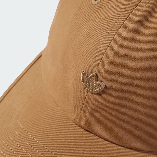 Premium Essentials Dad Cap Giving off easygoing vibes, this adidas cap has a packable design and minimalist style. Premium cotton and a moisture-wicking sweatband keep you comfortable. - Shell: 100% cotton - Sweatband: 100% cotton - Soft feel - D-ring back closure - Embroidered Trefoil Shipped by adidas