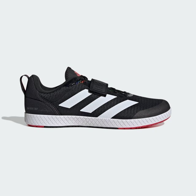 The Total Weightlifting Shoes Made for no-nonsense lifts, these adidas weightlifting shoes have a zero heel raise to create the low-to-the-ground stance preferred by many deadlifters. The combination of a wide strap and lacing offers uncompromising lockdown and a roomy toe box ensures you remain stable and comfortable under heavy weights. Underneath, a rubber outsole offers consistent contact with multiple surfaces.This product features at least 20% recycled materials. By reusing materials that have already been created, adidas help to reduce waste and our reliance on finite resources and reduce the footprint of the products adidas make. - Regular fit - Lace closure with hook-and-loop strap - Textile upper - Rubber outsole - Heel lift: 0 mm - Contains at least 20% recycled content Shipped by adidas