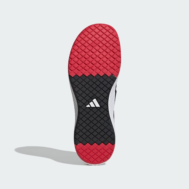 The Total Weightlifting Shoes Made for no-nonsense lifts, these adidas weightlifting shoes have a zero heel raise to create the low-to-the-ground stance preferred by many deadlifters. The combination of a wide strap and lacing offers uncompromising lockdown and a roomy toe box ensures you remain stable and comfortable under heavy weights. Underneath, a rubber outsole offers consistent contact with multiple surfaces.This product features at least 20% recycled materials. By reusing materials that have already been created, adidas help to reduce waste and our reliance on finite resources and reduce the footprint of the products adidas make. - Regular fit - Lace closure with hook-and-loop strap - Textile upper - Rubber outsole - Heel lift: 0 mm - Contains at least 20% recycled content Shipped by adidas