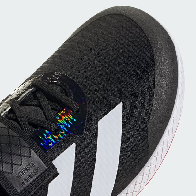 The Total Weightlifting Shoes Made for no-nonsense lifts, these adidas weightlifting shoes have a zero heel raise to create the low-to-the-ground stance preferred by many deadlifters. The combination of a wide strap and lacing offers uncompromising lockdown and a roomy toe box ensures you remain stable and comfortable under heavy weights. Underneath, a rubber outsole offers consistent contact with multiple surfaces.This product features at least 20% recycled materials. By reusing materials that have already been created, adidas help to reduce waste and our reliance on finite resources and reduce the footprint of the products adidas make. - Regular fit - Lace closure with hook-and-loop strap - Textile upper - Rubber outsole - Heel lift: 0 mm - Contains at least 20% recycled content Shipped by adidas
