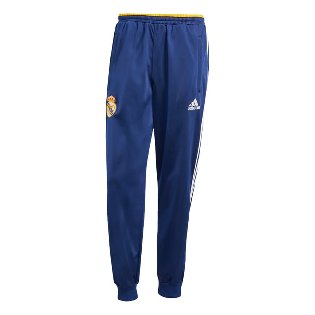 Real Madrid 99/00 Track Pants Relive a memorable European triumph in adidas Real Madrid track pants created to match those worn on the sidelines in the club's successful 99/00 season. Cut for a loose fit that's typical of 1990s football fashion, they layer easily over shorts. Woven onto the leg, that era-appropriate club badge supplies the perfect finish. - Loose fit - Elastic waist with drawcord - 100% polyester (recycled) - Front pockets - Real Madrid crest Shipped by adidas