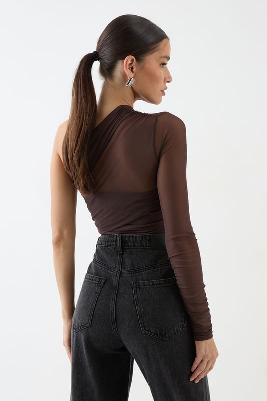 Striking one-shoulder design for a bold, asymmetric look
        Sheer mesh long sleeve adds allure and intrigue
        Figure-hugging bodysuit silhouette for a sleek fit
        Versatile piece that can be dressed up or down
        Perfect for making a statement on nights out
    
    Make heads turn in this daring mesh one-shoulder bodysuit from MissPap. The asymmetric neckline and sheer long sleeve create a captivating contrast, while the form-fitting silhouette accentuates your curves. For a night out on the town, pair it with high-waisted wide-leg jeans and statement heels to create a look that's both edgy and chic. Add some sparkle with bold earrings and a metallic clutch. When it's time to hit the dance floor, swap the jeans for a sleek mini skirt and strappy sandals. This versatile piece can also be layered under a blazer for a more sophisticated ensemble. Whether you're heading to a trendy bar or a pulsing nightclub, this bodysuit ensures you'll be the centre of attention all night long.